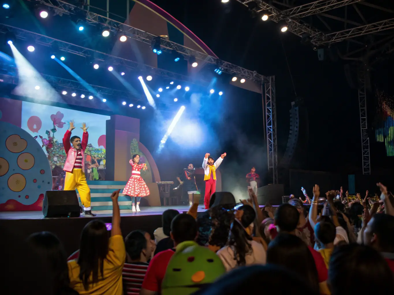 A vibrant image of a diverse group of people performing on stage during a community cultural event, with bright stage lights and an enthusiastic audience, capturing the spirit of inclusion.